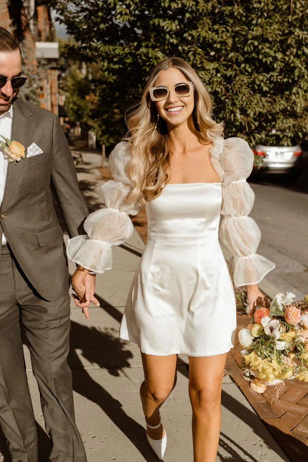 Vestidos de novia cortos de satén con mangas largas y corte entallado